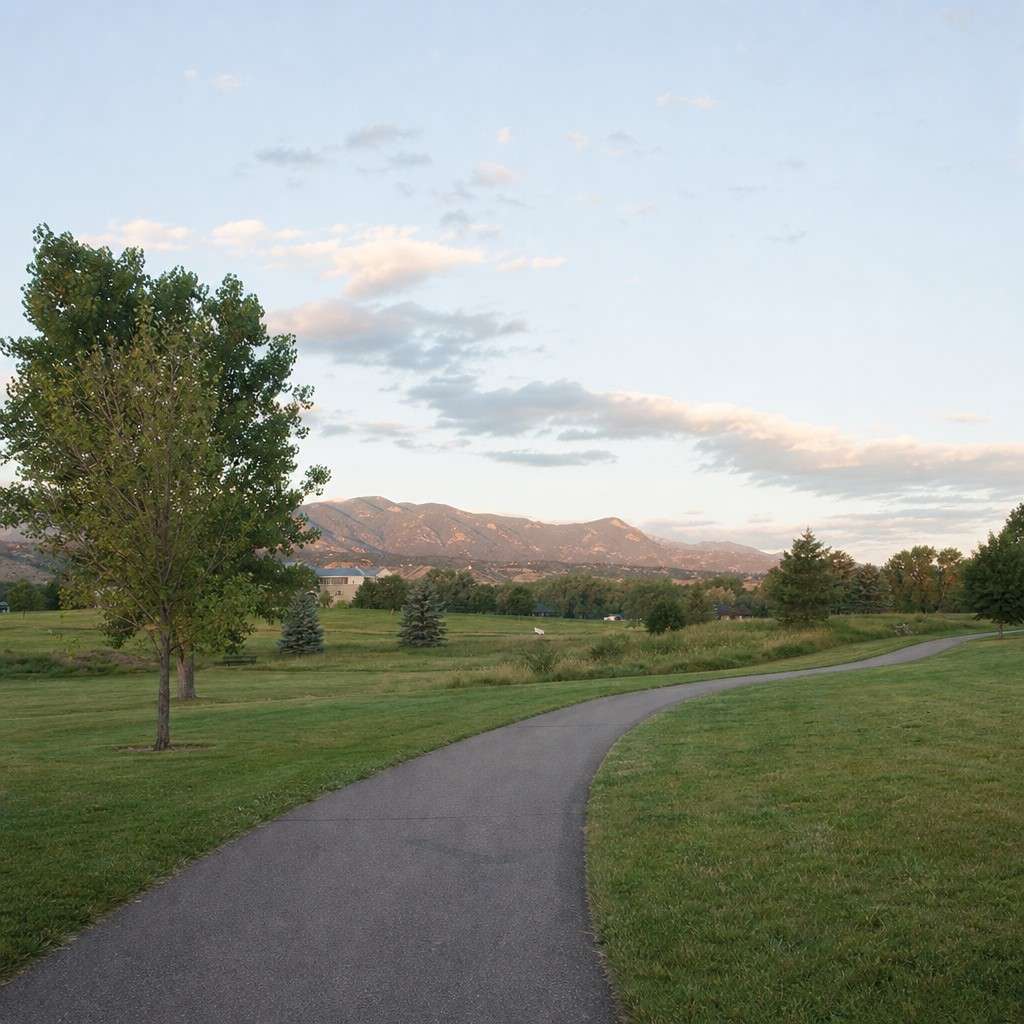 A flat, easy paved loop through a Denver city park, empty and inviting in the early morning